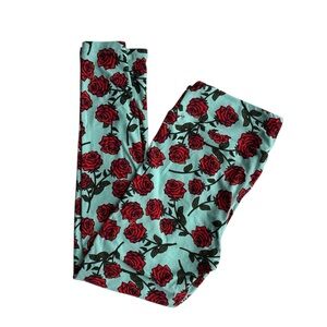 LuLaRoe TC rose leggings on a mint background. Brand new!